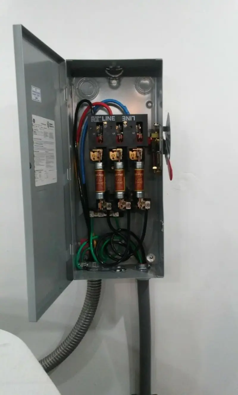 Three-phase disconnect switch installed for Smoke Detector Installation in Roxborough Park